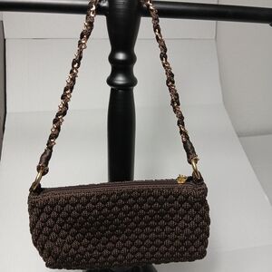 Lina chocolate brown crochet handbag with a gold chain braided strap. 
